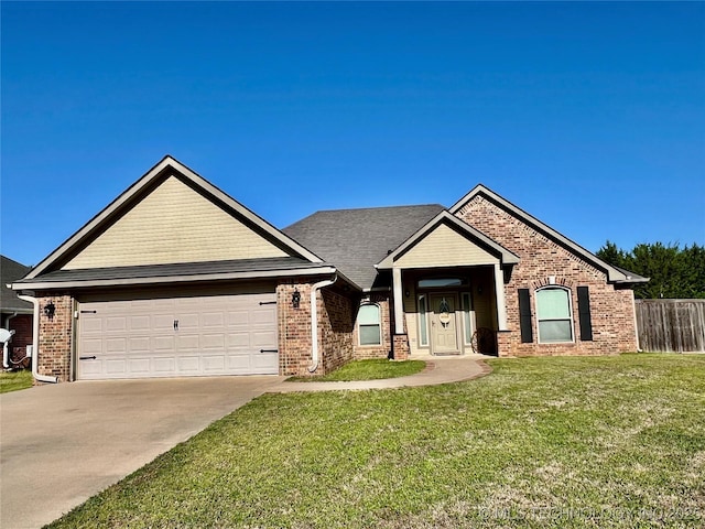 2516 Stage Coach Ave, Durant, OK 74701 - craftsman-style home featuring a garage, a front yard, fence, brick siding, and driveway