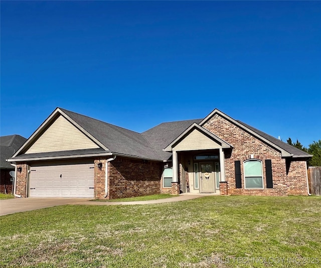 2516 Stage Coach Ave, Durant, OK 74701 - view of front of home with a garage, driveway, a front lawn, and brick siding