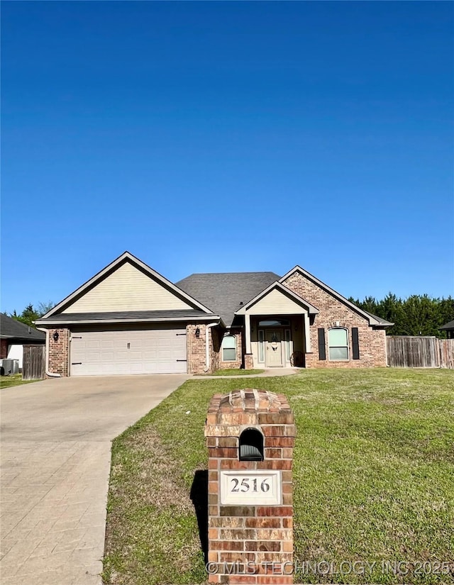 2516 Stage Coach Ave, Durant, OK 74701 - view of front of property with driveway, a front yard, fence, and a garage