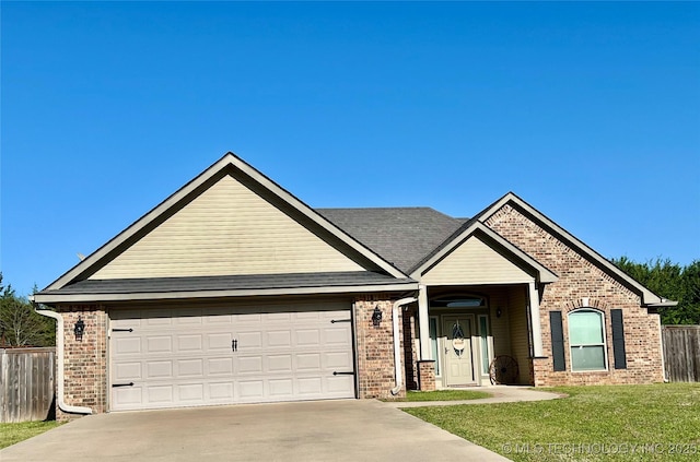 2516 Stage Coach Ave, Durant, OK 74701 - craftsman-style home with driveway, an attached garage, a front lawn, brick siding, and fence