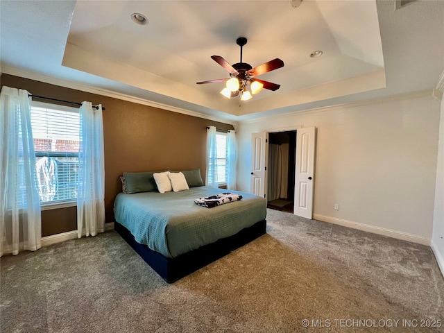 2516 Stage Coach Ave, Durant, OK 74701 - carpeted bedroom featuring a tray ceiling, baseboards, ornamental molding, and recessed lighting