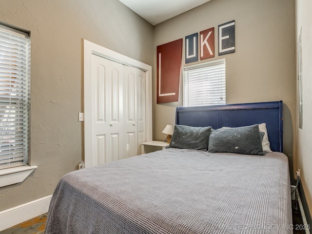 263 Eagles Nest Path, Stigler, OK 74462 - bedroom with baseboards and a closet