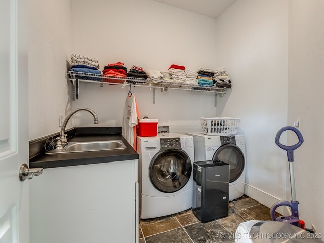263 Eagles Nest Path, Stigler, OK 74462 - laundry area featuring separate washer and dryer, stone finish flooring, laundry area, and a sink