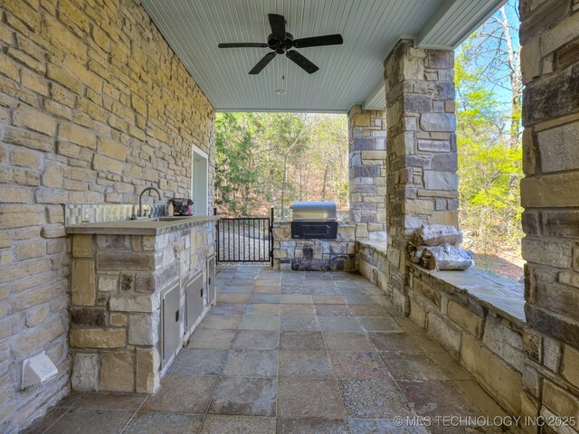 263 Eagles Nest Path, Stigler, OK 74462 - view of patio with an outdoor kitchen, ceiling fan, grilling area, and a sink