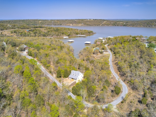 263 Eagles Nest Path, Stigler, OK 74462 - bird's eye view featuring a wooded view and a water view