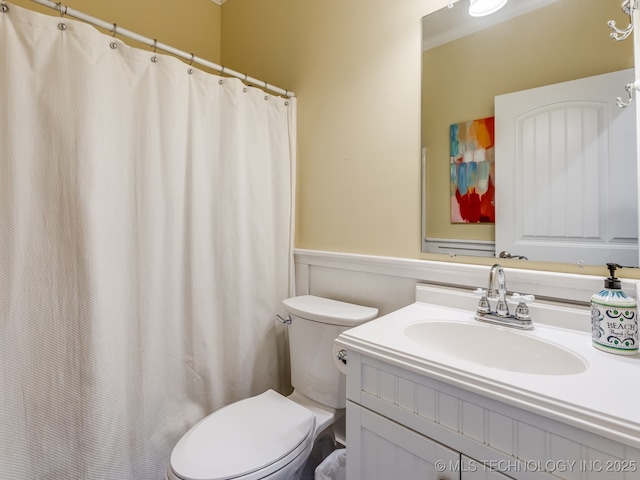 263 Eagles Nest Path, Stigler, OK 74462 - full bathroom with a wainscoted wall, vanity, and toilet