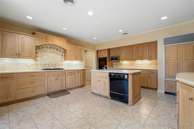 kitchen with black appliances, decorative backsplash, visible vents, and light countertops