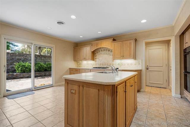 kitchen with a sink, recessed lighting, decorative backsplash, crown molding, and light countertops