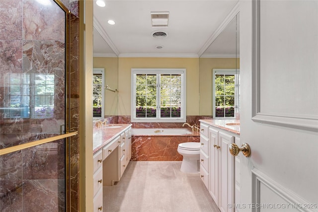 bathroom featuring a garden tub, vanity, a stall shower, and visible vents