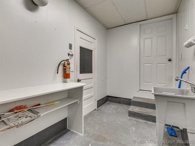 1558 E 59th Pl, Tulsa, OK 74105 - misc room with unfinished concrete floors