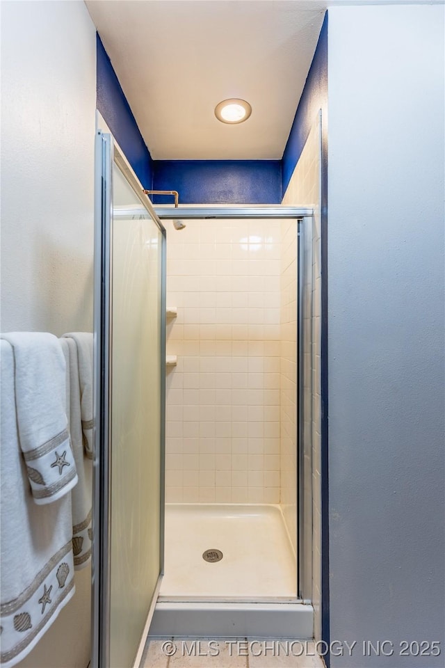 bathroom with a stall shower