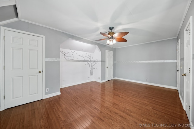 3531 E 100th St, Tulsa, OK 74137 - unfurnished bedroom with wood finished floors, crown molding, baseboards, and ceiling fan