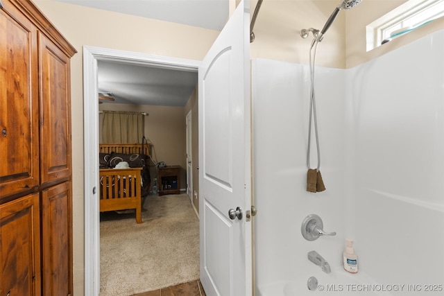 hall with carpet floors