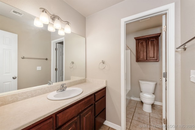 705 SW 20th St, Wagoner, OK 74467 - bathroom with vanity, baseboards, tile patterned flooring, toilet, and visible vents