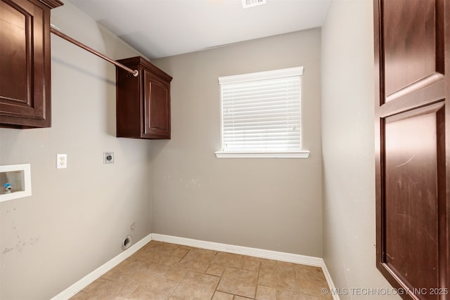 705 SW 20th St, Wagoner, OK 74467 - washroom featuring hookup for an electric dryer, baseboards, washer hookup, visible vents, and cabinet space