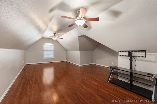705 SW 20th St, Wagoner, OK 74467 - additional living space with baseboards, vaulted ceiling, a textured ceiling, ceiling fan, and wood finished floors