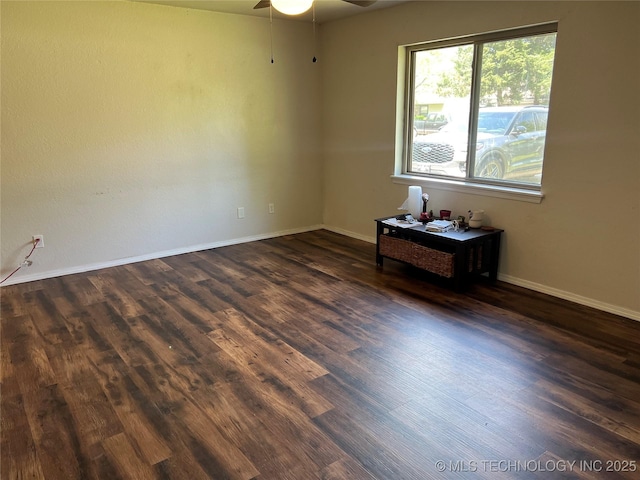 28494 E 139th St S, Coweta, OK 74429 - empty room featuring ceiling fan, baseboards, and dark wood finished floors