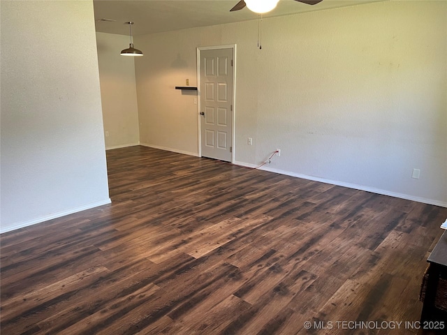 28494 E 139th St S, Coweta, OK 74429 - unfurnished room with ceiling fan, baseboards, and dark wood finished floors