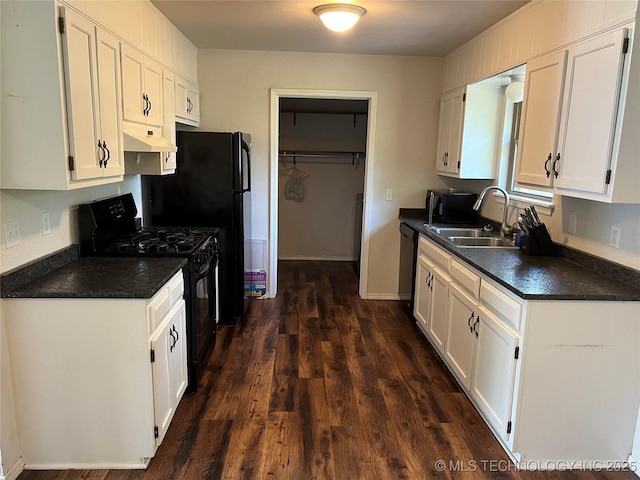 28494 E 139th St S, Coweta, OK 74429 - kitchen with under cabinet range hood, a sink, white cabinetry, and black appliances
