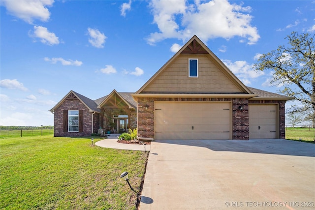 369102 E 960 Road, Road, OK 74833 - craftsman inspired home with a garage, a front yard, fence, brick siding, and driveway