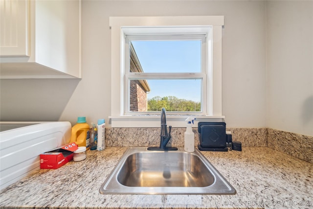 369102 E 960 Road, Road, OK 74833 - room details with a sink and white cabinetry