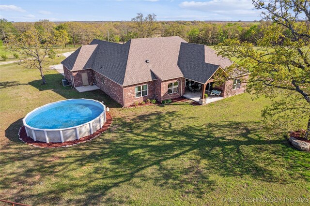 369102 E 960 Road, Road, OK 74833 - exterior space featuring a patio area and a lawn