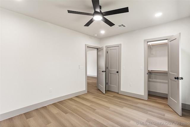 824 Wilson, Durant, OK 74701 - unfurnished bedroom with light wood-style flooring, baseboards, visible vents, and recessed lighting