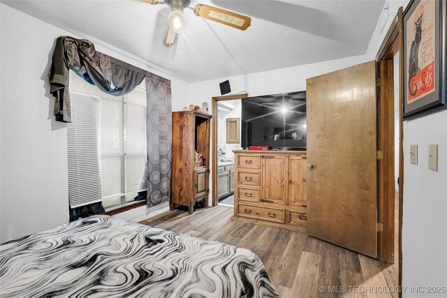 6370 S 29th W Pl, Tulsa, OK 74132 - bedroom with light wood-type flooring and ceiling fan