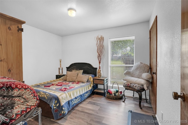 6370 S 29th W Pl, Tulsa, OK 74132 - bedroom featuring wood finished floors