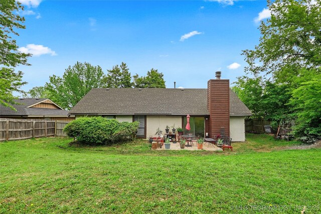 6370 S 29th W Pl, Tulsa, OK 74132 - rear view of property featuring a chimney, a patio area, roof with shingles, and stucco siding