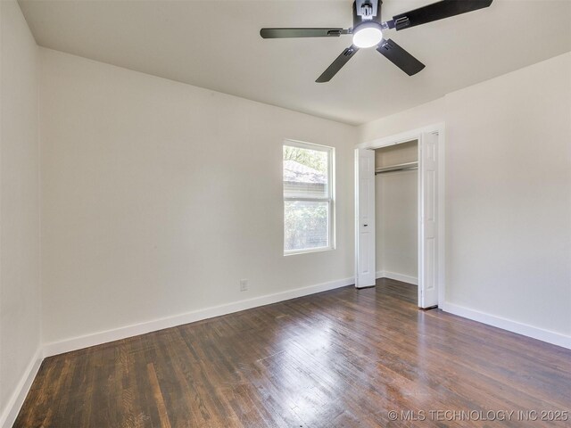 4916 S Cincinnati Ave, Tulsa, OK 74105 - unfurnished bedroom with dark wood-style floors, a closet, ceiling fan, and baseboards