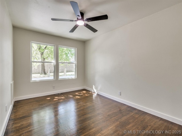 4916 S Cincinnati Ave, Tulsa, OK 74105 - empty room with ceiling fan, baseboards, and dark wood-type flooring