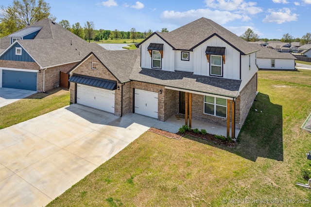 view of front of property featuring roof with shingles, driveway, board and batten siding, a front lawn, and a garage