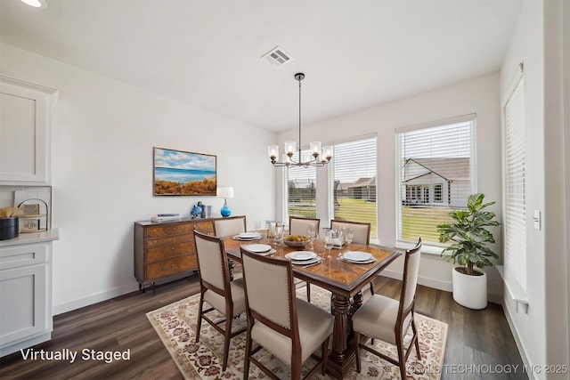 dining space featuring visible vents, baseboards, an inviting chandelier, and dark wood-style floors