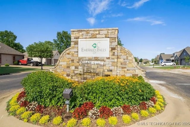 community sign with a residential view