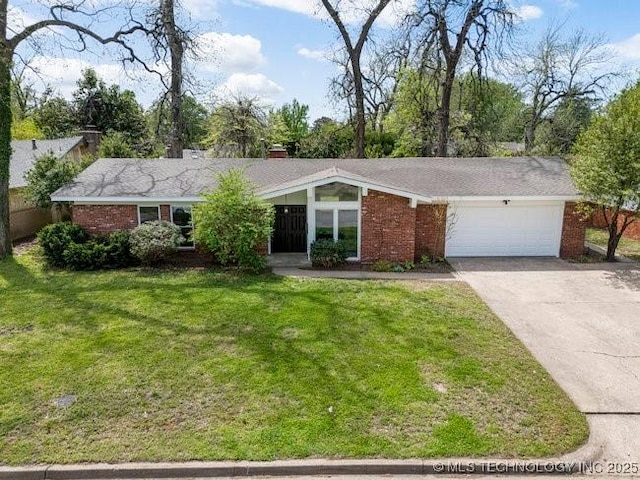1612 E 56th Pl, Tulsa, OK 74105 - ranch-style house featuring an attached garage, driveway, a front lawn, and brick siding