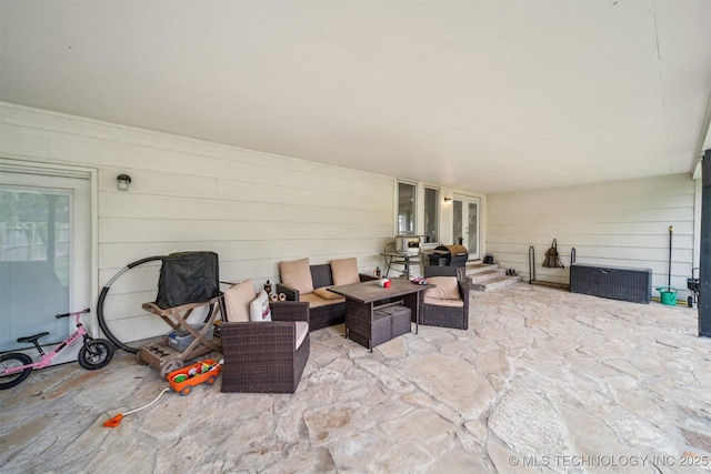 view of patio / terrace with an outdoor hangout area and french doors
