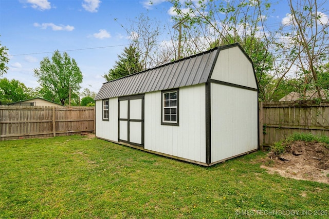 view of shed with a fenced backyard