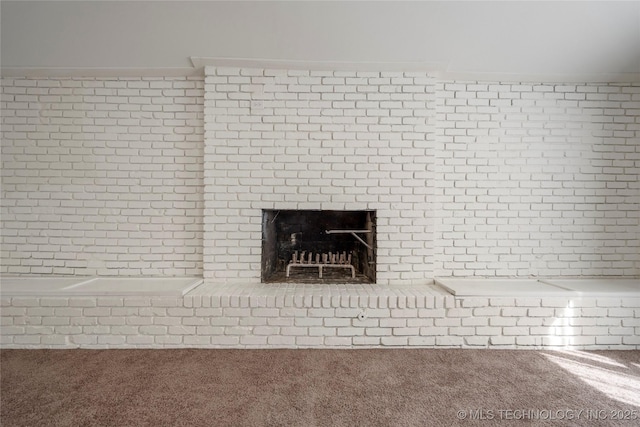 details with a brick fireplace and carpet floors