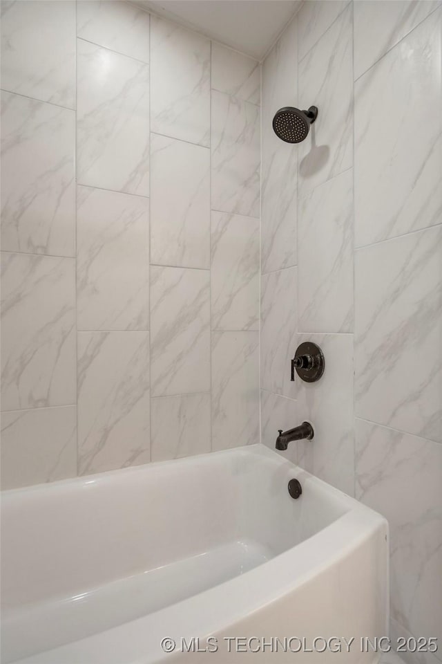 bathroom featuring bathtub / shower combination
