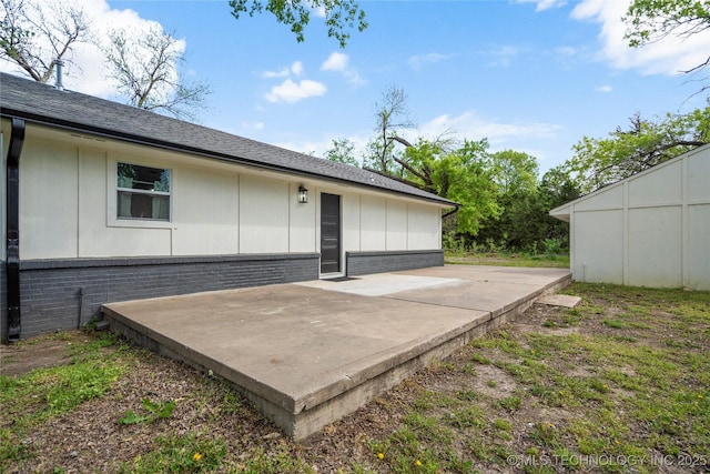 rear view of house featuring a patio area