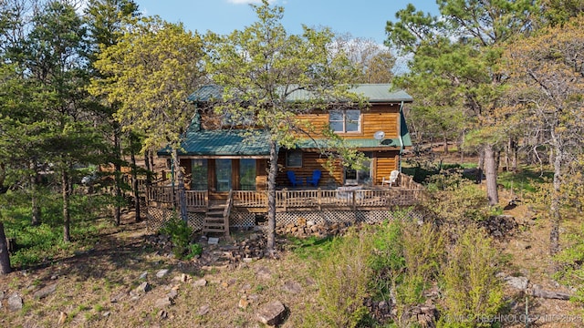 14484 Valley View Dr, Skiatook, OK 74070 - back of property featuring a deck and a metal roof