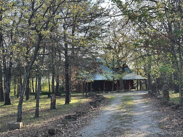 14484 Valley View Dr, Skiatook, OK 74070 - view of front of home featuring driveway and a metal roof