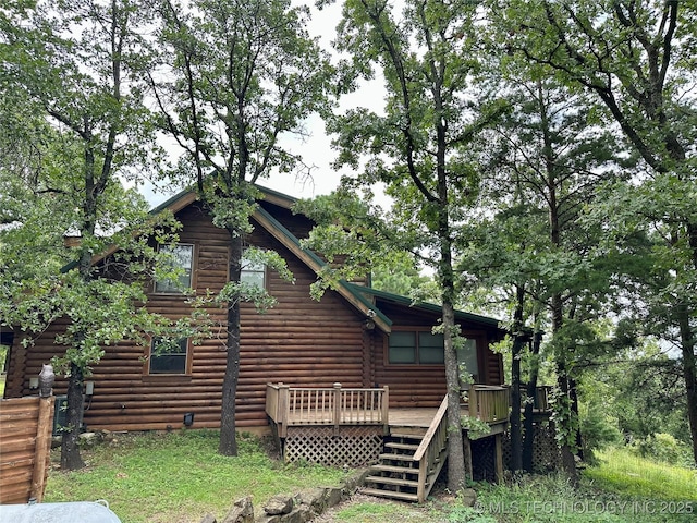 14484 Valley View Dr, Skiatook, OK 74070 - view of side of property featuring a deck, log siding, and stairway