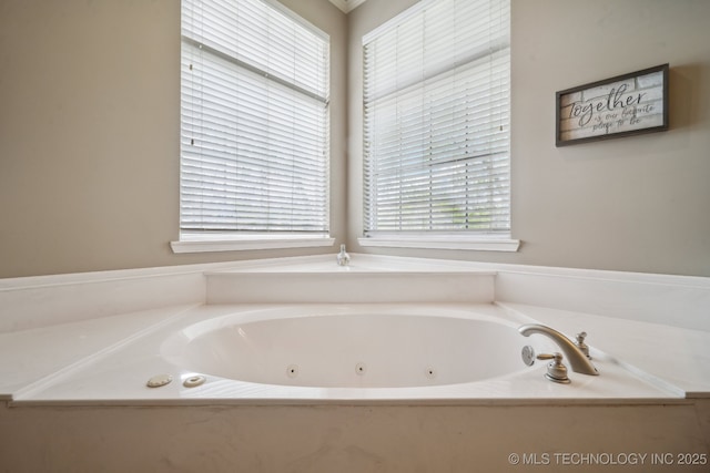 bathroom with a jetted tub