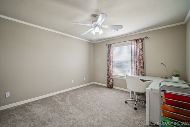home office with ornamental molding, ceiling fan, carpet flooring, and baseboards