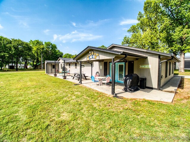 1668 Waters Rd, Kingston, OK 73439 - rear view of property with a patio area and a yard