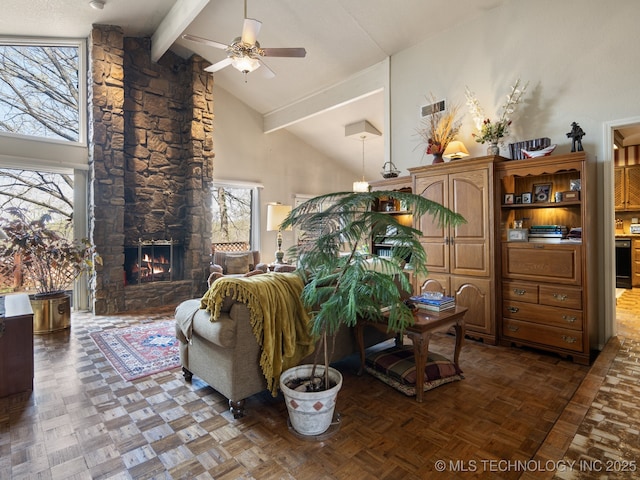 8404 S Toledo Ave, Tulsa, OK 74137 - living area with visible vents, ceiling fan, beam ceiling, and a healthy amount of sunlight