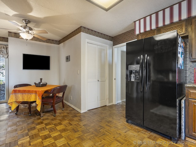 8404 S Toledo Ave, Tulsa, OK 74137 - dining room featuring baseboards and ceiling fan