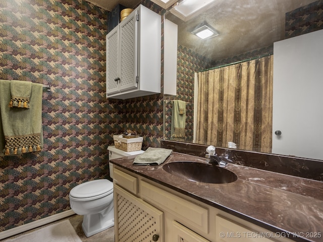 8404 S Toledo Ave, Tulsa, OK 74137 - bathroom with toilet, wallpapered walls, vanity, and a shower with shower curtain